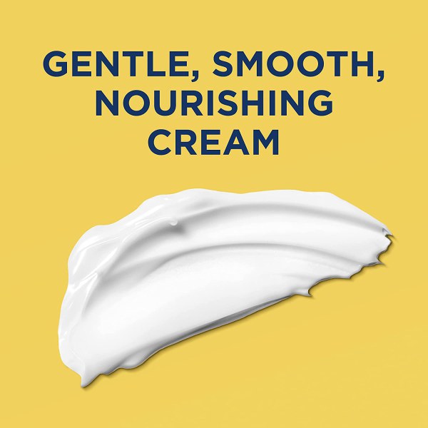 بافت کرمی نرم و لطیف کرم سینت ایوز مدل Renewing روی زمینه زرد با شعار Nourishing Cream