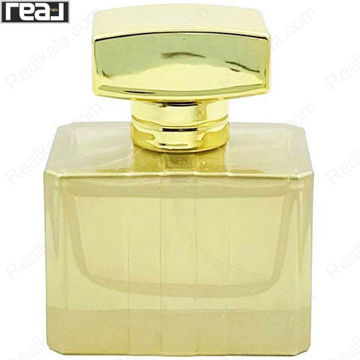 ادکلن برند کالکشن کد 040 گوچی پریمیر زنانه با طراحی مستطیلی، بدنه طلایی براق و درپوش خمیده طلایی