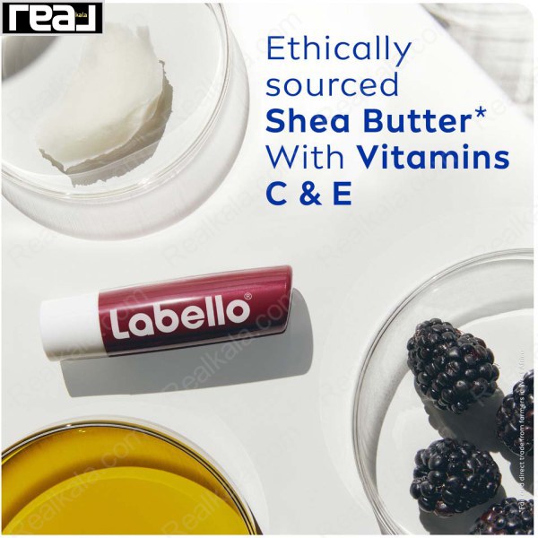 ترکیبات طبیعی و تمشک در کنار بالم لب Labello مدل Blackberry Shine