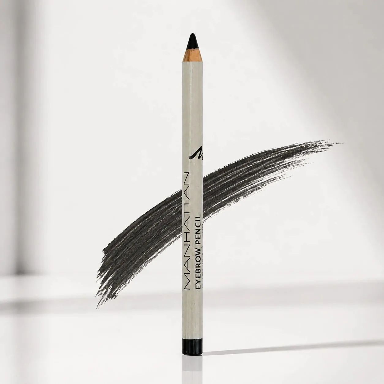 مداد ابرو MANHATTAN Eyebrow Pencil 109W با نوک مشکی، بدنه چوبی